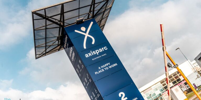 Sign for Axisparc, a business and conference center.